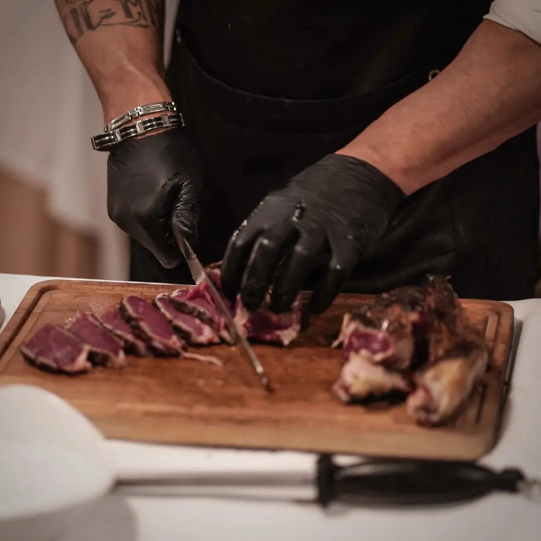 Cutting meat at Asador Iñaki