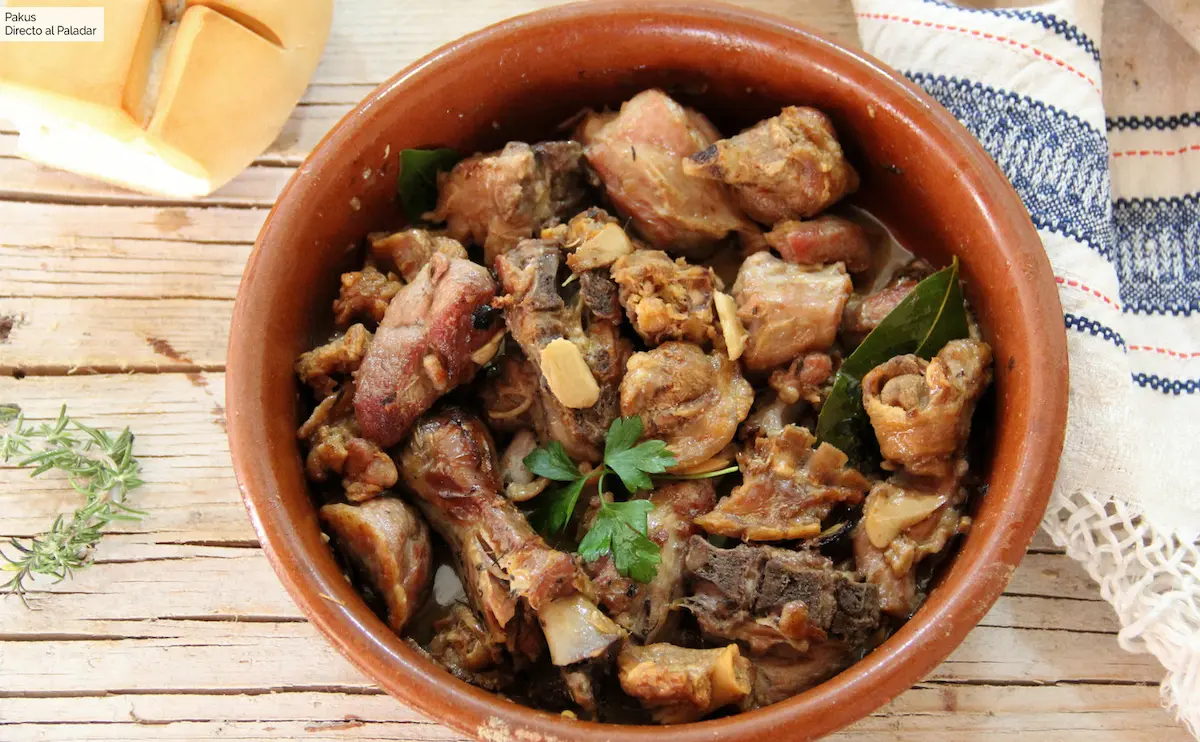 Delicious typical dish of goat with garlic