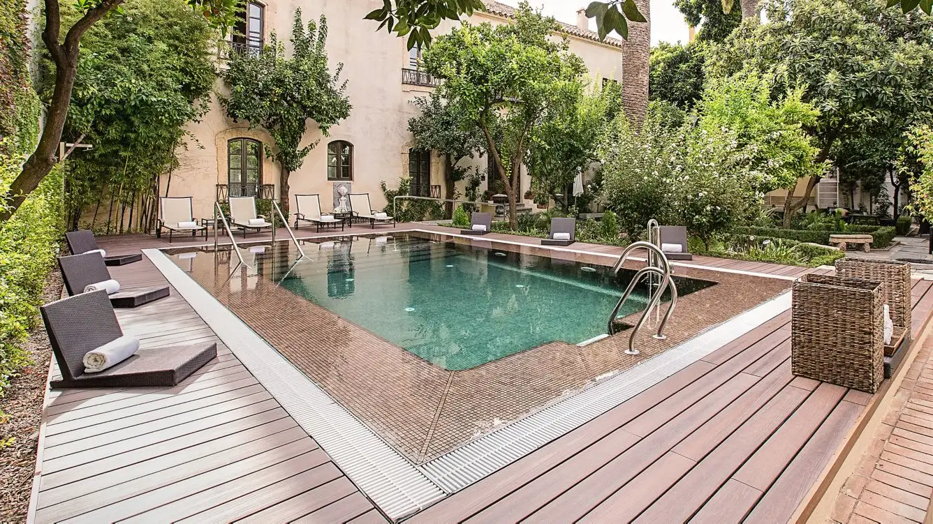 Outdoor pool at Hospes Palacio del Bailío hotel in Córdoba